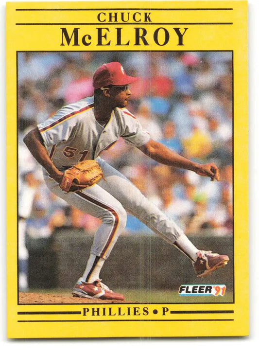 Yellow-bordered baseball card of Chuck McElroy pitching for the Philadelphia Phillies