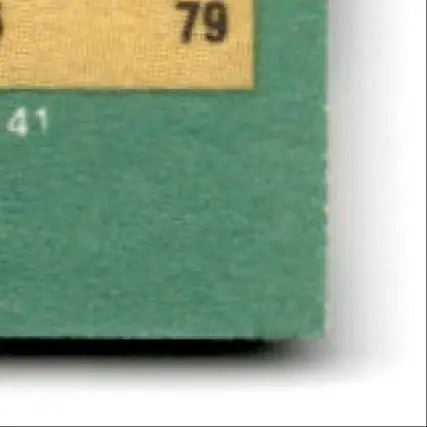 Textured green card corner with yellow stripe and number 79 for Fleer Football Jerry Rice