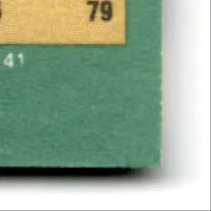 Textured green card corner with yellow stripe and number 79 for Fleer Football Jerry Rice