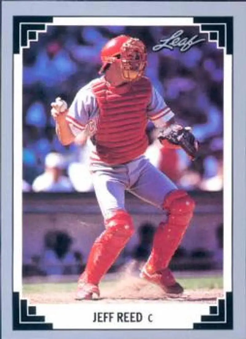 Baseball catcher Jeff Reed in red gear, ready to play for Cincinnati Reds