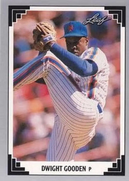 Baseball player Dwight Gooden in New York Mets uniform mid-pitch for baseball card