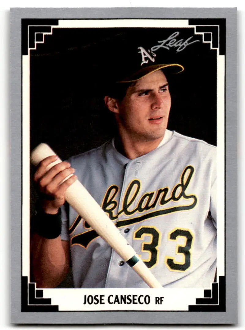 Jose Canseco in Oakland Athletics uniform holding a bat on baseball card