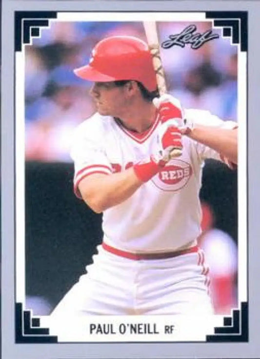 Baseball card of Paul O’Neill in Cincinnati Reds uniform at bat with red trim