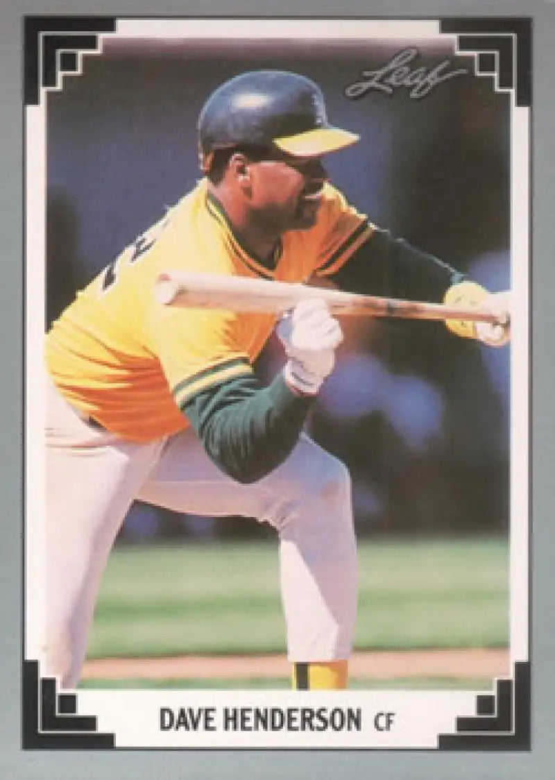 Baseball player Dave Henderson in Oakland Athletics uniform preparing to bunt