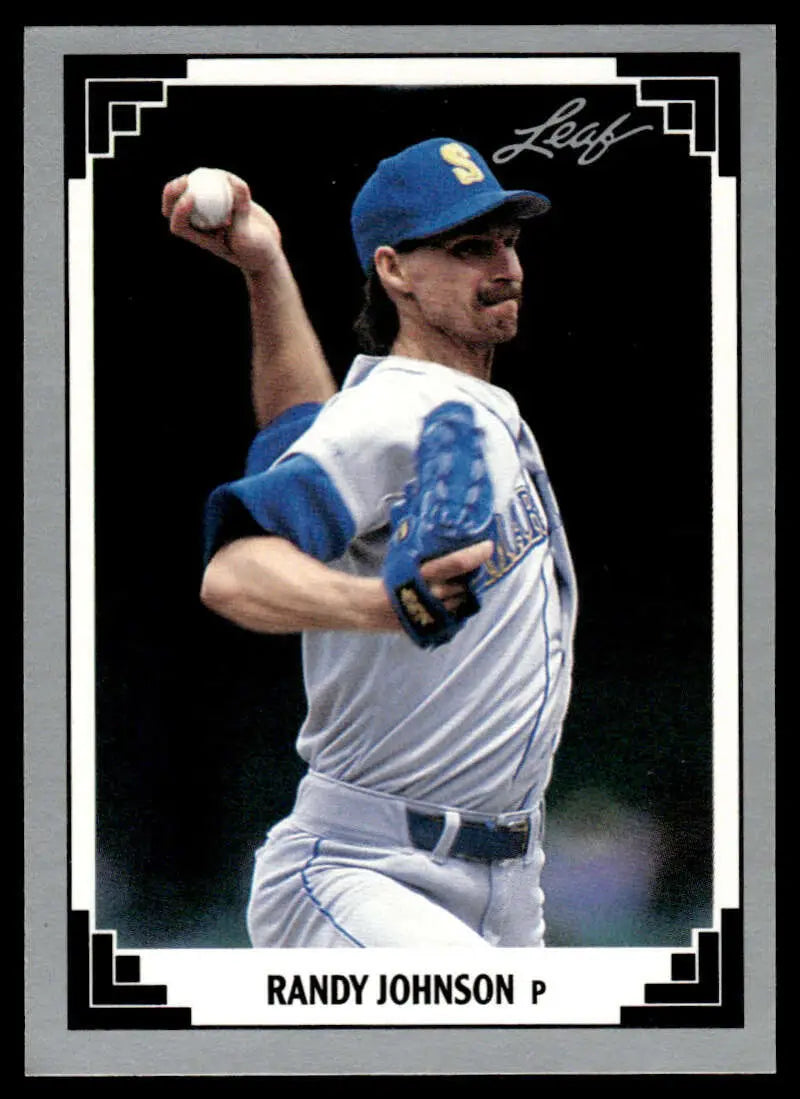 Baseball card of Randy Johnson pitching in a Seattle Mariners white uniform