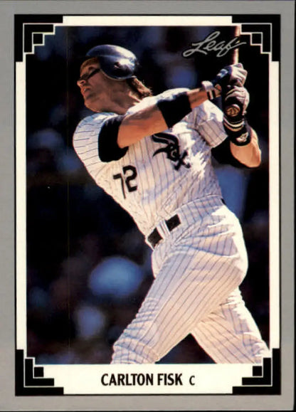 Chicago White Sox player swinging bat in pinstriped uniform for baseball card