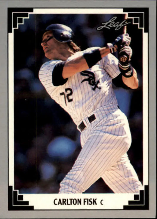 Chicago White Sox player swinging bat in pinstriped uniform for baseball card