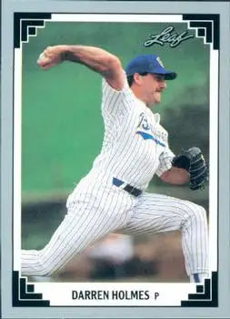 Baseball player Darren Holmes in pinstriped uniform pitching for Milwaukee Brewers