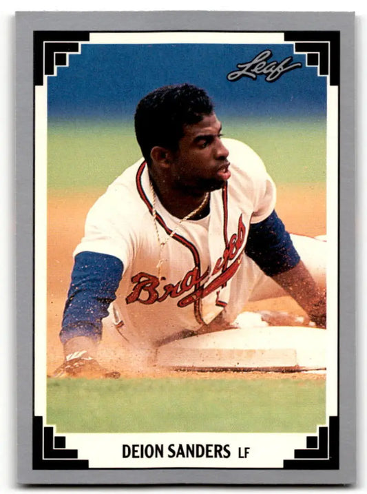 Baseball player Deion Sanders in Atlanta Braves uniform sliding into base on card