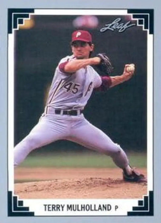Terry Mulholland in a white uniform on a Philadelphia Phillies baseball card