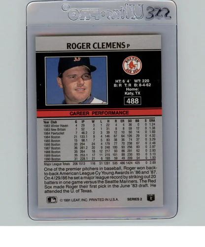 Baseball card of Roger Clemens in protective case with Red Sox logo and stats