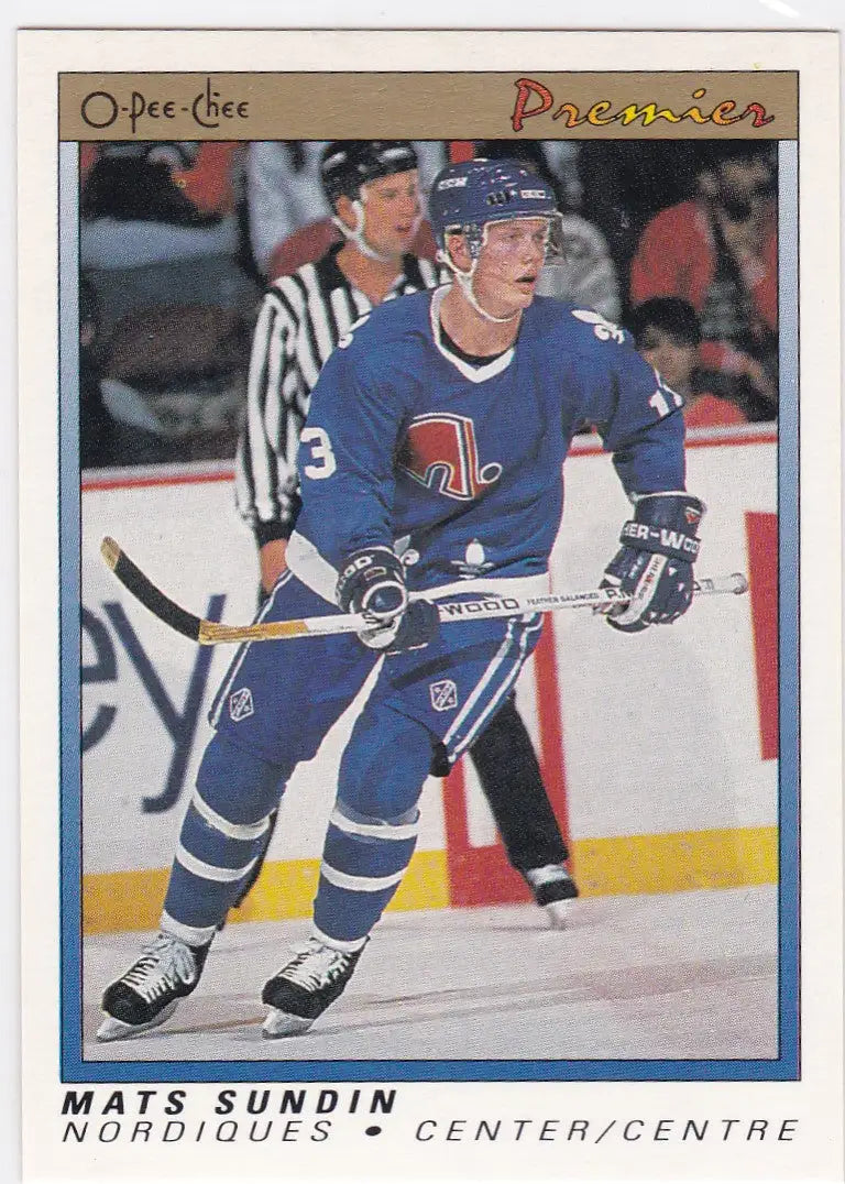 Hockey player in blue Quebec Nordiques jersey showcasing OPC Premiere Rookie Mats Sundin RC