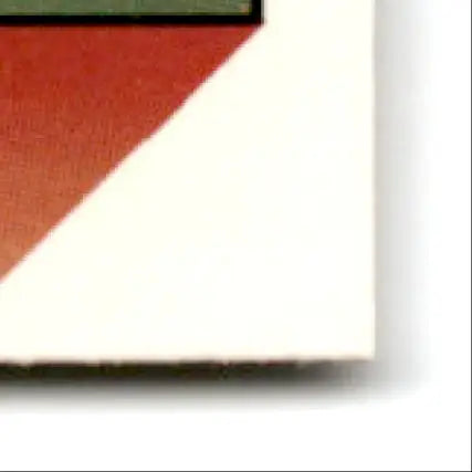 Corner of a playing card featuring red and white diagonal design from Pacific Football Steve Young San Francisco 49ers card
