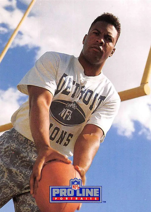 Person in Detroit Lions t-shirt against blue sky for Rodney Peete football card