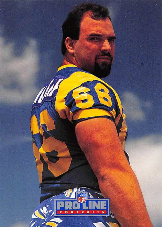 NFL player in yellow and blue Los Angeles Rams jersey with number 68, Tom Newberry