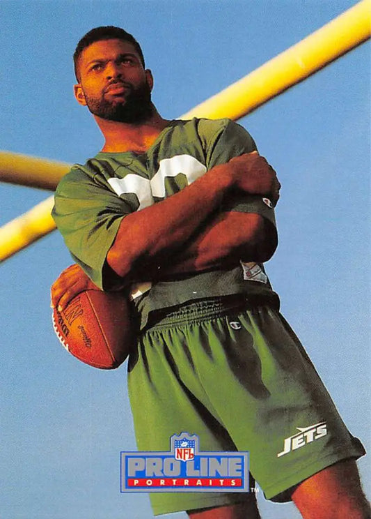 Football player in green New York Jets uniform holding football, Pro Line Portraits card