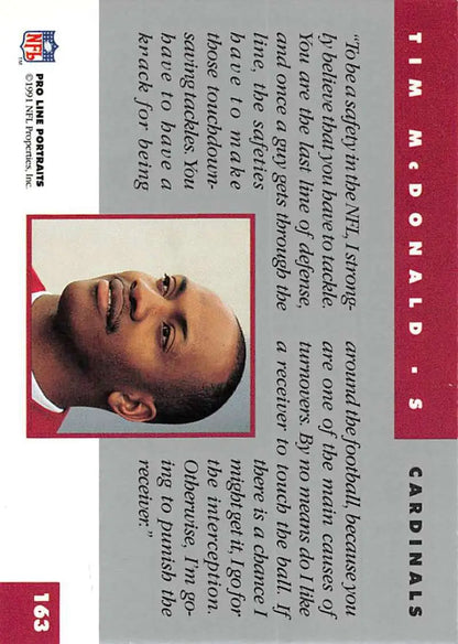1991 Pro Line Portraits Tim McDonald Football Card in burgundy and gray for Phoenix Cardinals