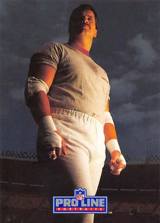 Matt Millen in white pants and gray shirt featured on a Pro Line Portraits football card