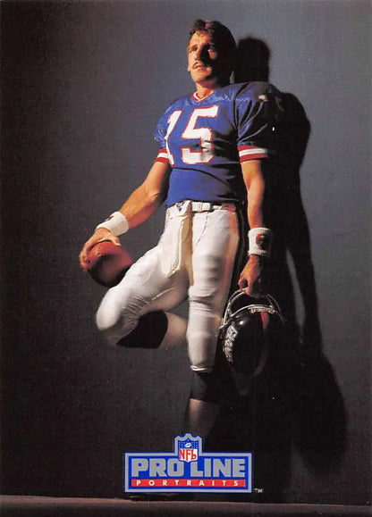 Jeff Hostetler in blue #15 jersey holding a helmet and football for New York Giants card