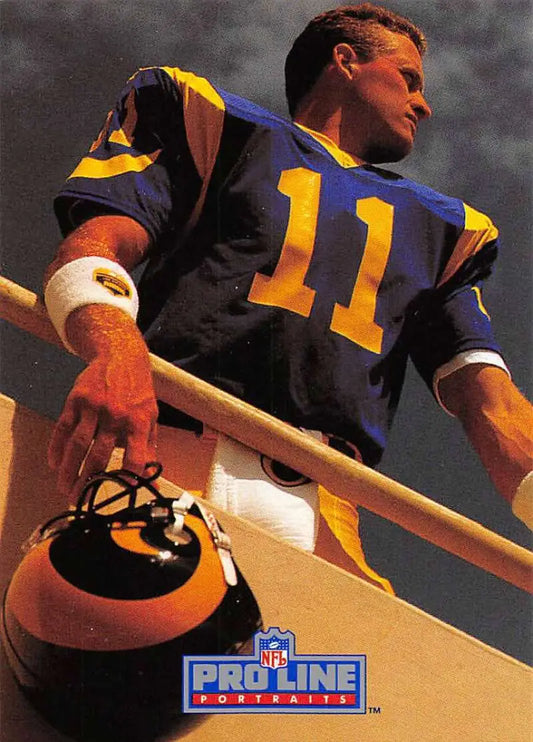 NFL player in blue and yellow #11 jersey showcasing Jim Everett, Los Angeles Rams