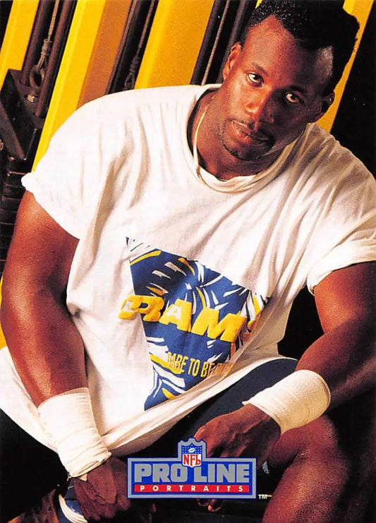 Person in white t-shirt featuring blue and yellow graphic design with Marcus Dupree theme