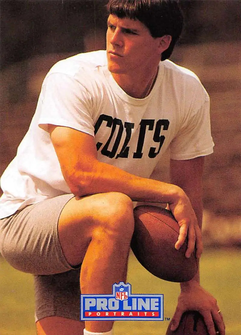 Football player in Colts gear with football, highlighting Dean Biasucci Football Card