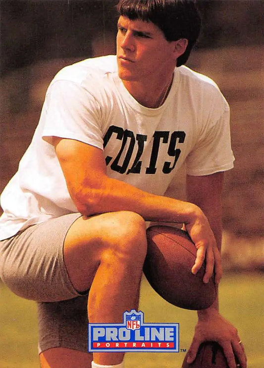 Football player in Colts gear with football, highlighting Dean Biasucci Football Card