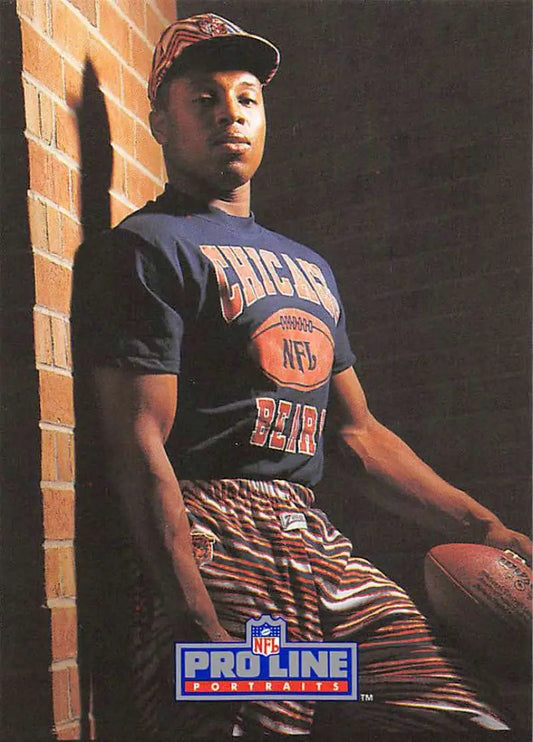 Donnell Woolford in a Chicago Bears NFL shirt and shorts, holding a football