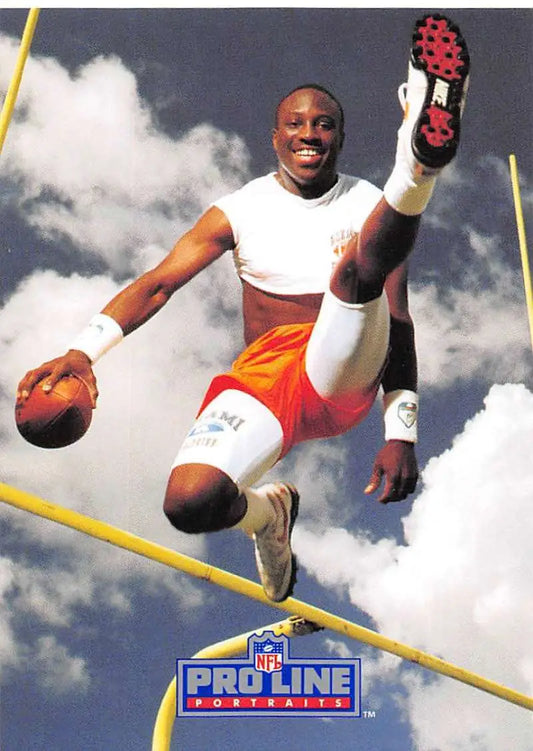 Randal Hill leaps for a catch in his Miami Dolphins uniform on Pro Line Portraits card