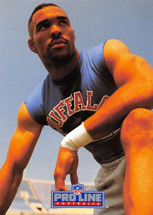 NFL player in Buffalo Bills jersey crouching athletic stance for Henry Jones football card