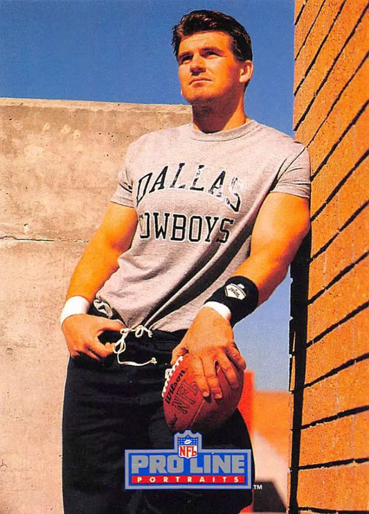 Person in Dallas Cowboys shirt with football, showcasing Robert Awalt Pro Line Portraits