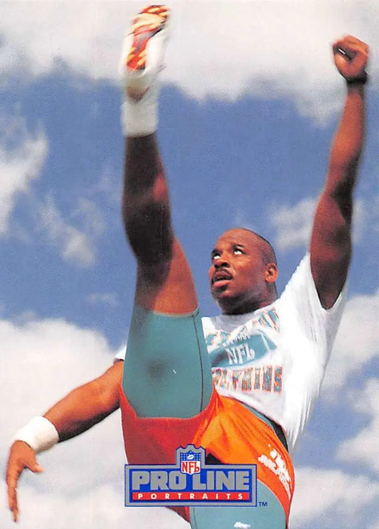 Reggie Roby celebrating against the sky on 1991 Pro Line Portraits #72 Miami Dolphins card