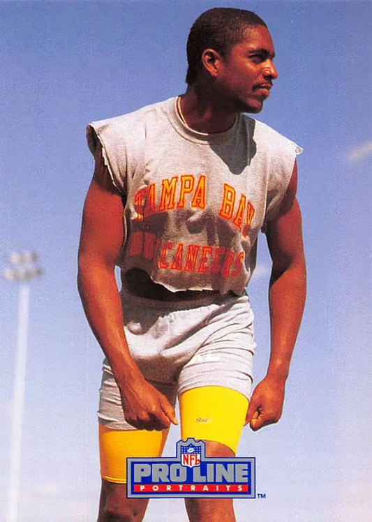 Football player in Tampa Bay Buccaneers jersey and shorts, featuring Bruce Hill