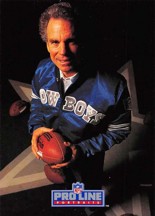 Person in a Dallas Cowboys jacket holding a football, showcasing Pro Line Portraits style