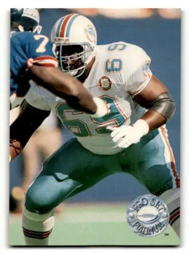 Football player in action stance on 1991 Pro Set Platinum Keith Sims Miami Dolphins card