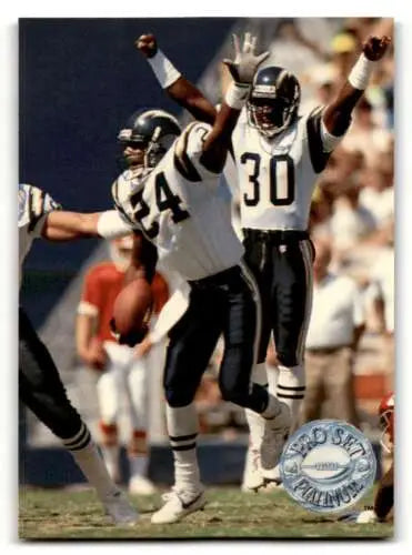 Football players celebrating with original gloss Pro Set Platinum Stanley Richard San Diego Chargers