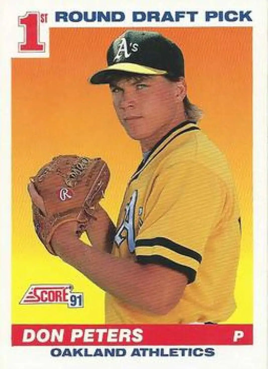 1991 Score #381 Don Peters Rookie Baseball Card of Oakland Athletics pitcher in yellow uniform