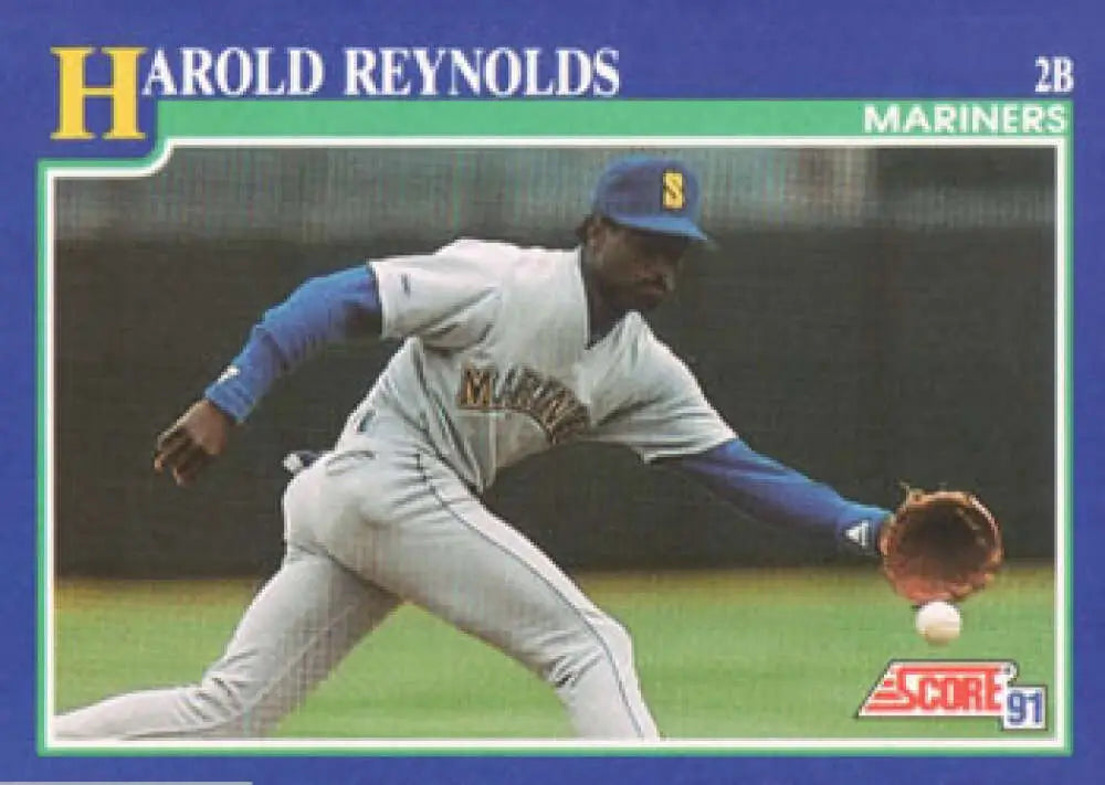 1991 Score #48 Harold Reynolds baseball card showing Seattle Mariners player fielding ground ball