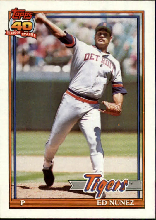 Baseball card of Edwin Nunez mid-throw in white uniform for Detroit Tigers