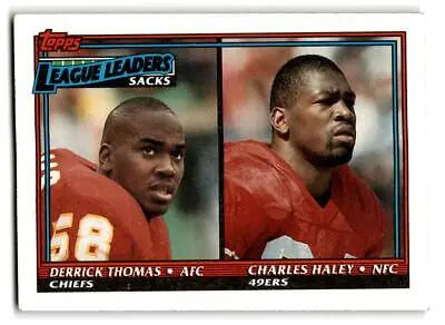 1991 Topps #12a Football Trading Card featuring Sacks Leaders Derrick Thomas and Charles Haley