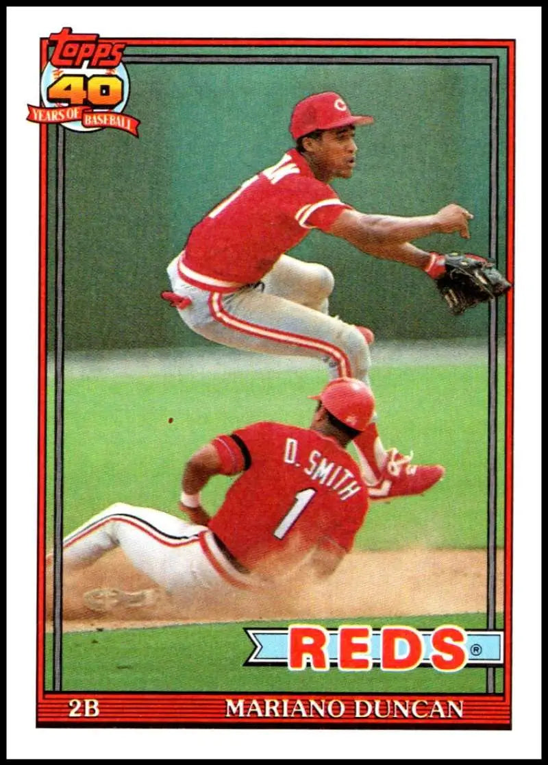 Mariano Duncan double play attempt in red uniform on 1991 Topps Cincinnati Reds card