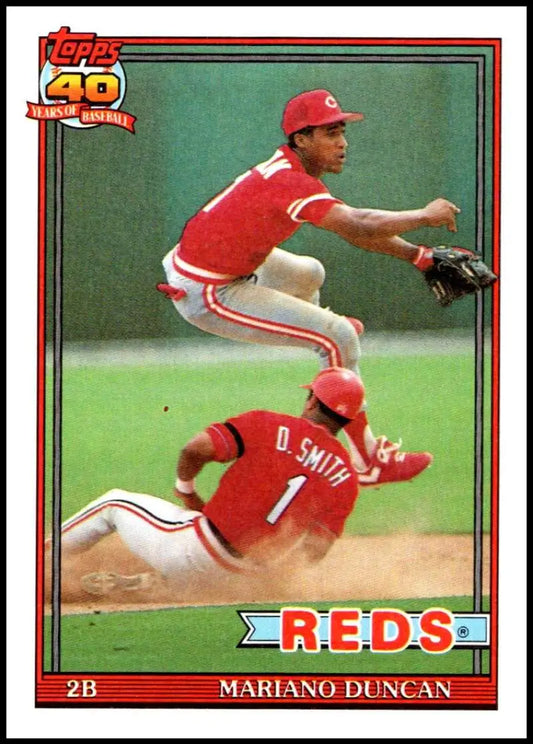 Mariano Duncan double play attempt in red uniform on 1991 Topps Cincinnati Reds card