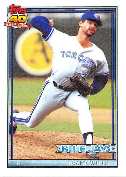 Toronto Blue Jays baseball card of Frank Wills in mid-delivery, 1991 Topps #213