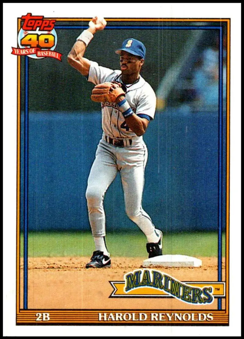 Harold Reynolds Seattle Mariners baseball card with a second baseman in a throwing motion