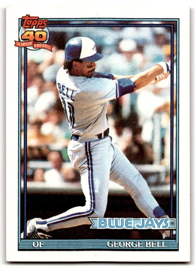 1991 Topps #440 George Bell mid-swing in a white uniform for Toronto Blue Jays