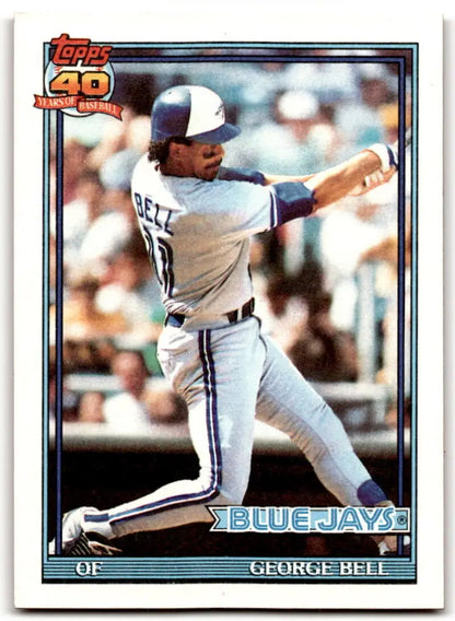 1991 Topps #440 George Bell mid-swing in a white uniform for Toronto Blue Jays