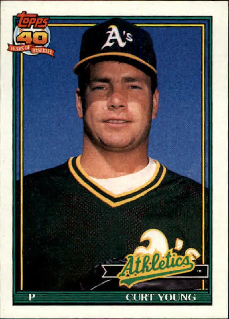 Curt Young Oakland Athletics baseball card in green and gold uniform, Topps 1991 #473