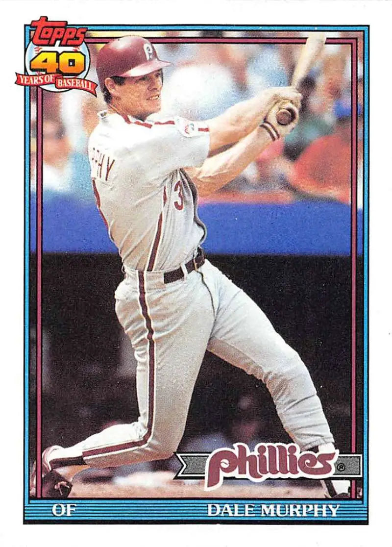 Dale Murphy mid-swing on a 1991 Topps Phillies baseball card in white uniform
