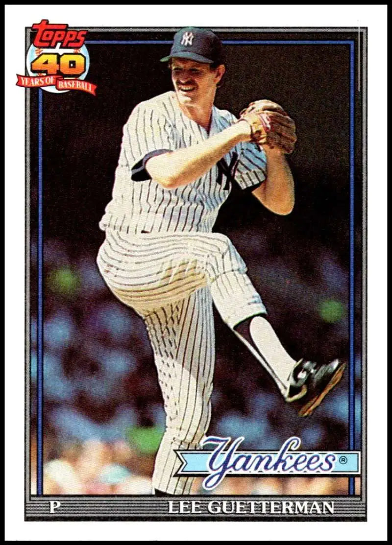 Lee Guetterman delivering a pitch on a Yankees baseball card in pinstriped uniform