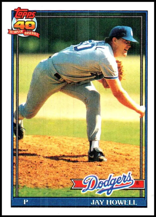 Baseball card of Jay Howell pitching for Los Angeles Dodgers in mid-delivery motion